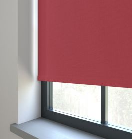 Our Amor Shiraz Roller blind in a living room window.