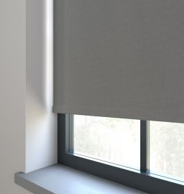 Our Amor Shark Grey Roller blind in a bedroom window.