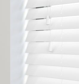 Editions Angel White - A front view of a closed white faux wooden venetian blind
