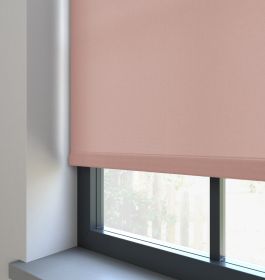 Our Burst Champagne Pink Roller blind in the living room.