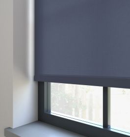 Our Burst Royal Blue Roller blind in a living room window.