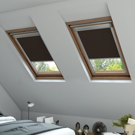 A side on view of a brown skylight blind in a window