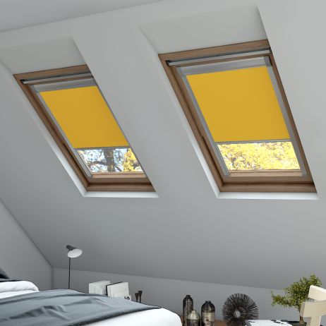 A side on image of a yellow coloured skylight blind in a skylight window