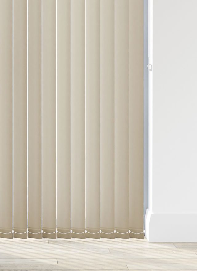 A cream vertical blind in a living room