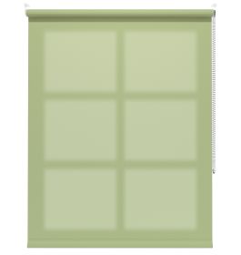 A green dimout roller blind in a window