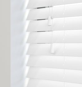Editions Angel White - A front view of a closed white faux wooden venetian blind
