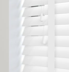 Editions Angel White With Lilly Tapes - White wooden venetian blind with slats in the closed position and bright white tapes