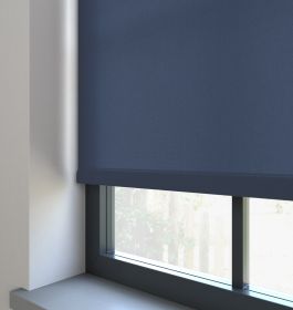 Our Burst Cobalt dimout roller blind in the bedroom window.