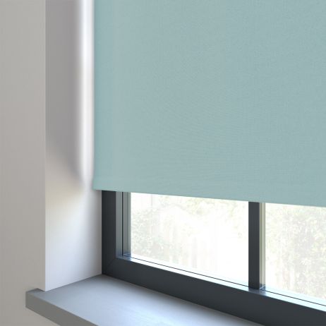 Our Amor Baby Blue Roller blind in a kitchen window.