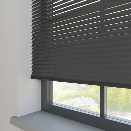 A dark aluminium blind in a window