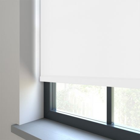 A dimout roller blind in a window