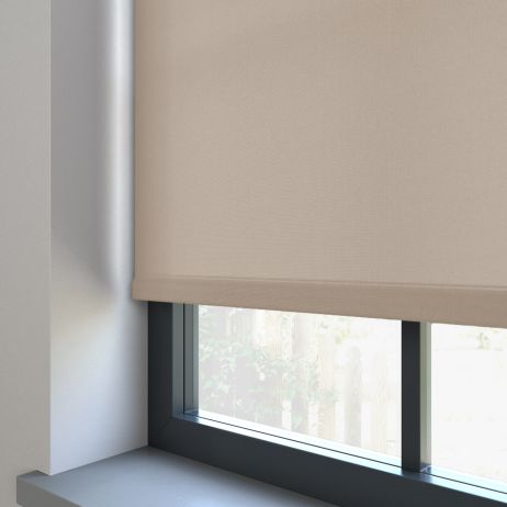 A dimout roller blind in a window