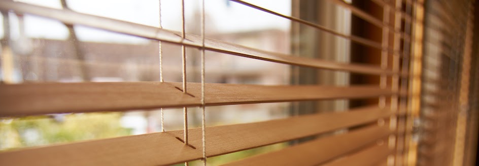 Closeup of faux wood blinds